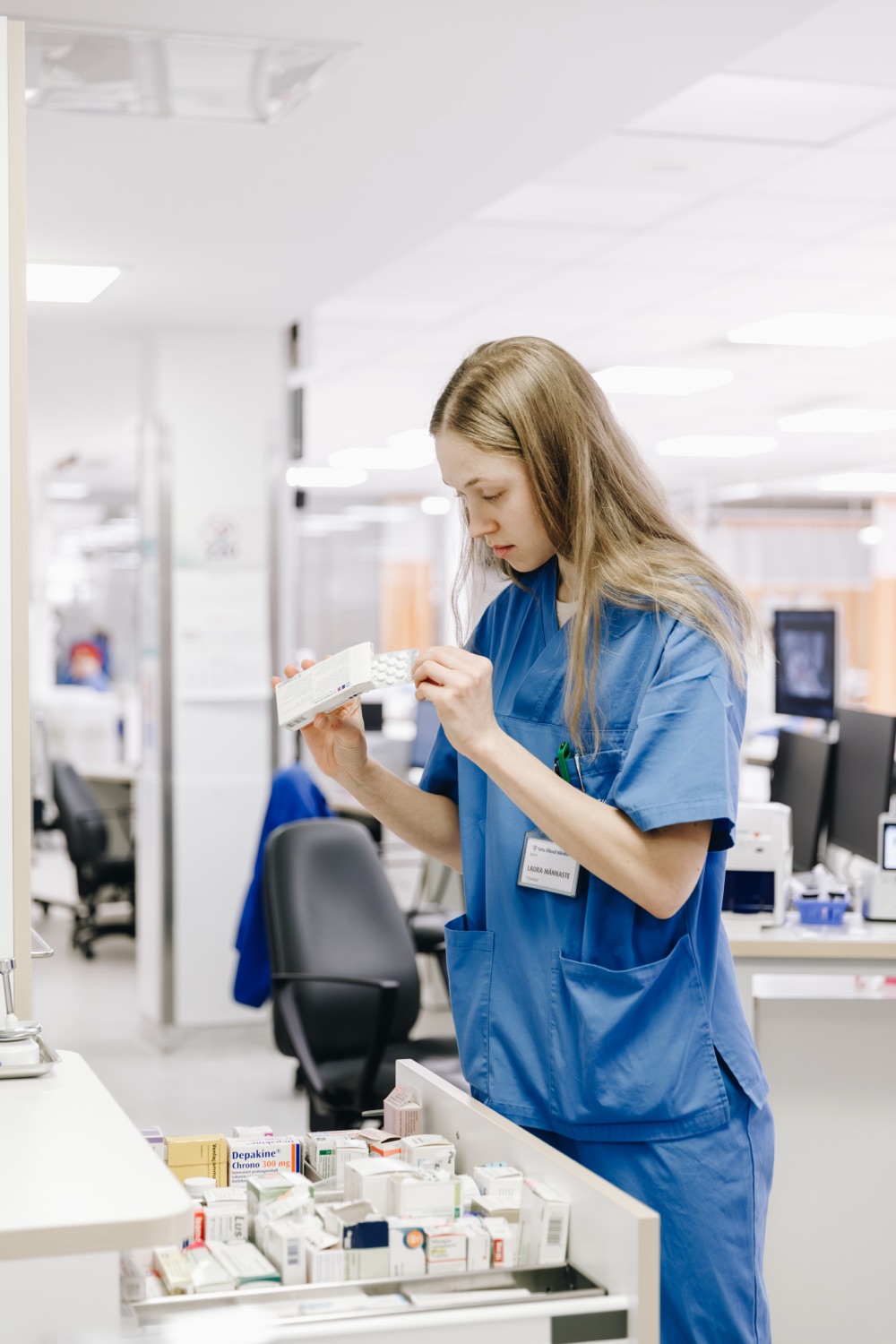 A pharmacist reviewing medication in a clinical pharmacy at the University of Tartu